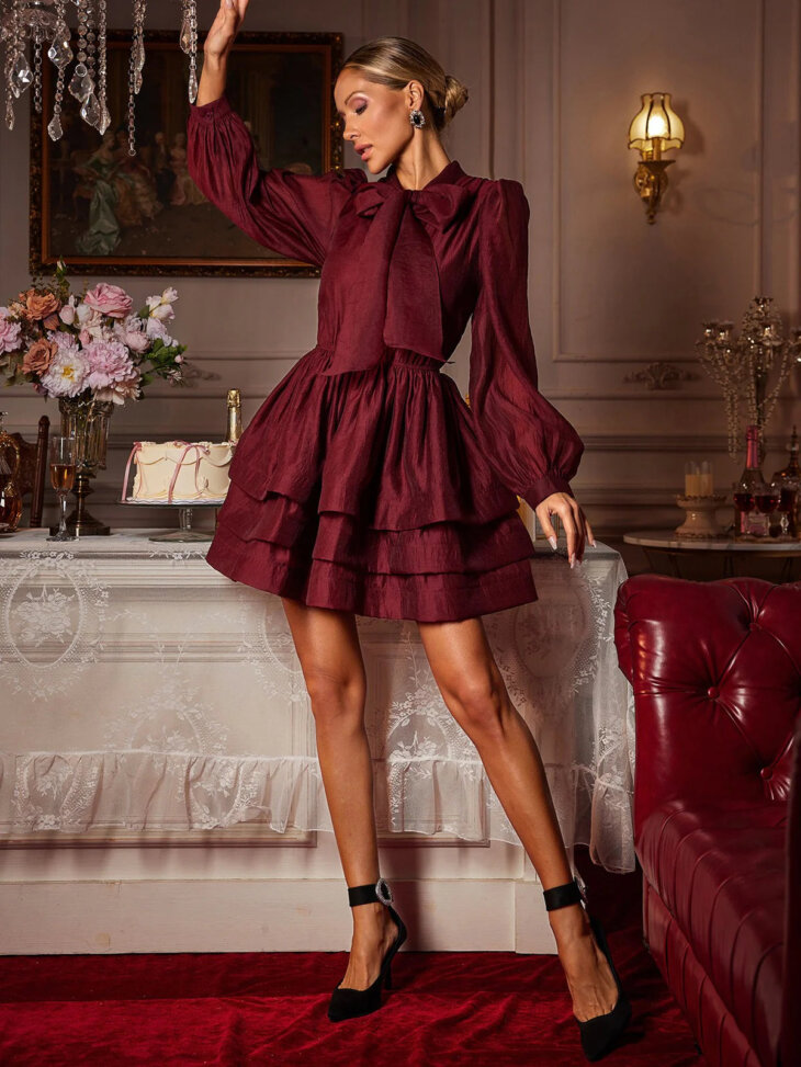 Eairein - Mini-robe à volants et manches longues avec nœud